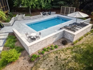 inground pool and patio furniture